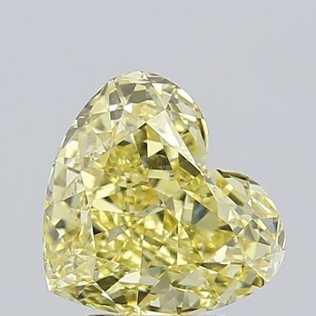 Loose Diamond - HEART 3.3ct Fancy Intense Yellow VS1: Loose Diamond - HEART 3.3ct Fancy Intense Yellow VS1 Source: This is a real non-mined Diamond that has been grown in a lab Shape: HEART Carats: 3.3 Color: Fancy Intense Yellow Certification: IGI Video