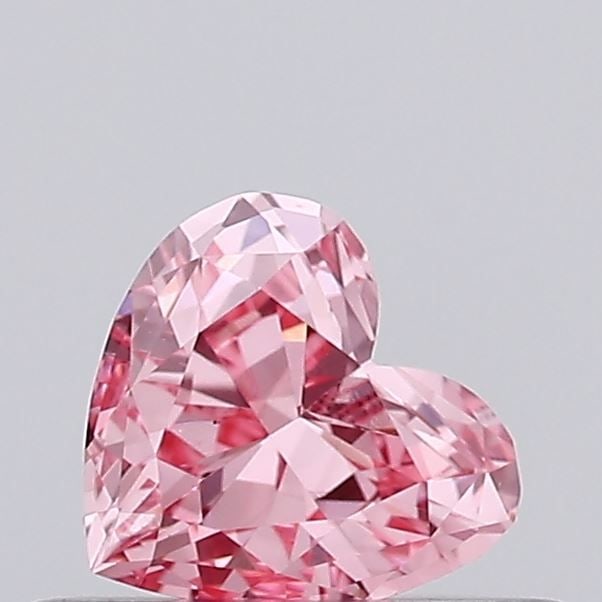Loose Diamond - HEART 0.29ct Fancy Vivid Pink VS1: Loose Diamond - HEART 0.29ct Fancy Vivid Pink VS1 Source: This is a real non-mined Diamond that has been grown in a lab Shape: HEART Carats: 0.29 Color: Fancy Vivid Pink Certification: IGI Video: