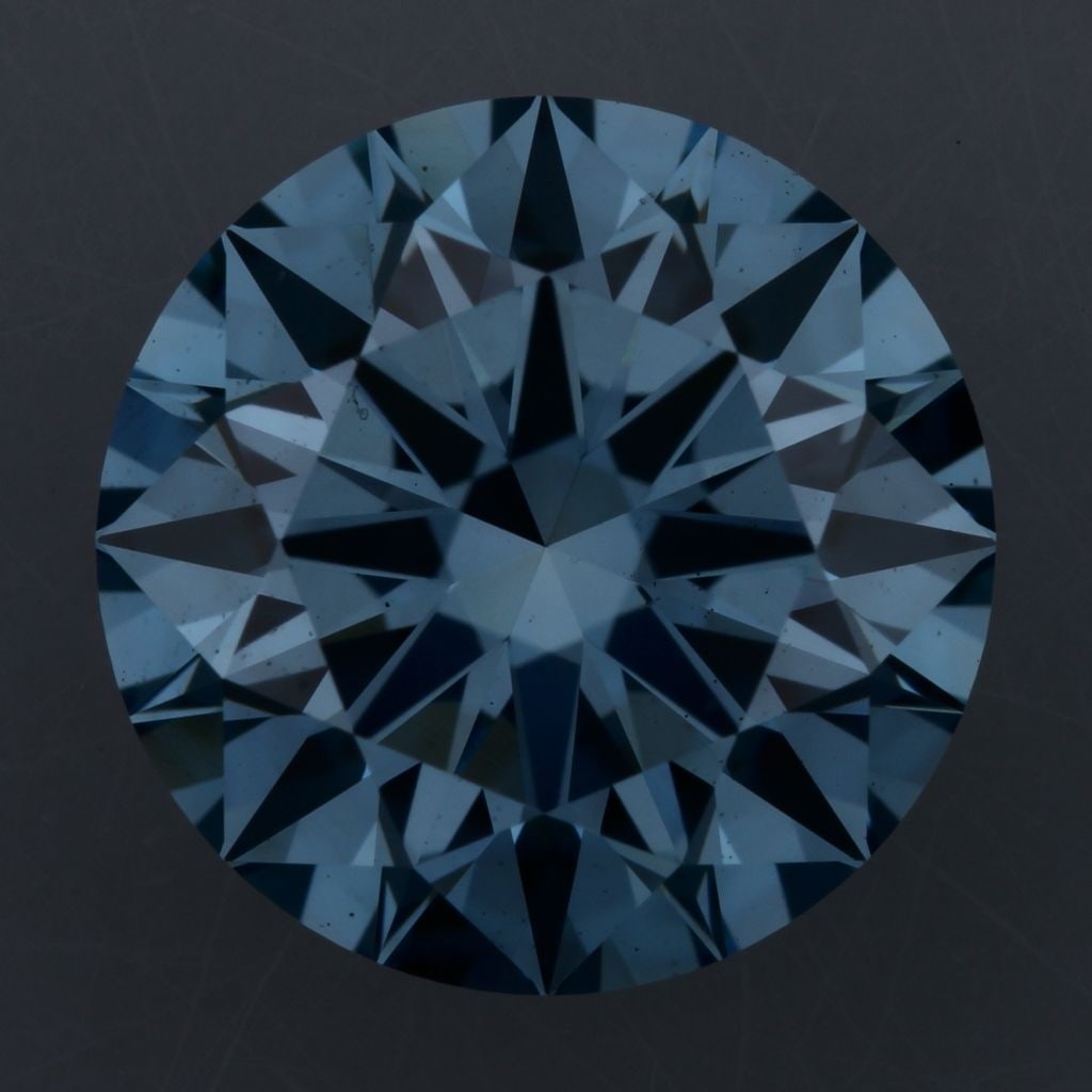 Ideal Loose Diamond - ROUND 1.62ct Fancy Vivid Blue VS1: Ideal Loose Diamond - ROUND 1.62ct Fancy Vivid Blue VS1 Source: This is a real non-mined Diamond that has been grown in a lab Shape: ROUND Carats: 1.62 Color: Fancy Vivid Blue Certification: IGI Video
