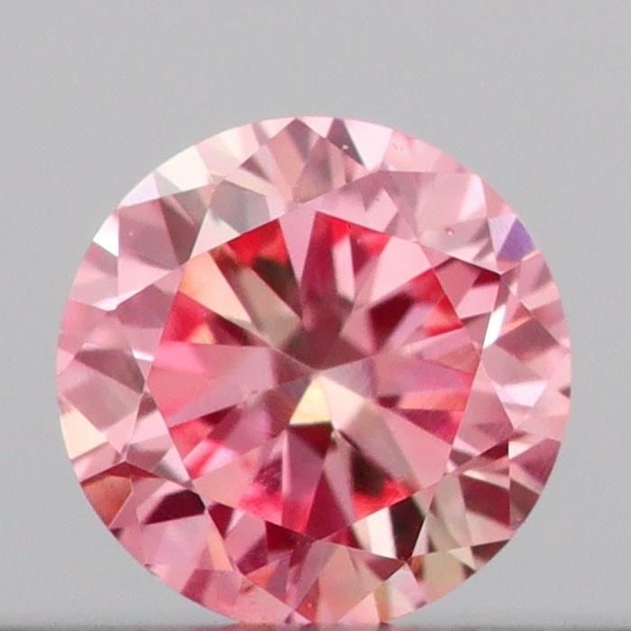 Loose Diamond - ROUND 0.14ct Fancy Intense Pink VS2: Loose Diamond - ROUND 0.14ct Fancy Intense Pink VS2 Source: This is a real non-mined Diamond that has been grown in a lab Shape: ROUND Carats: 0.14 Color: Fancy Intense Pink Certification: IGI Video: