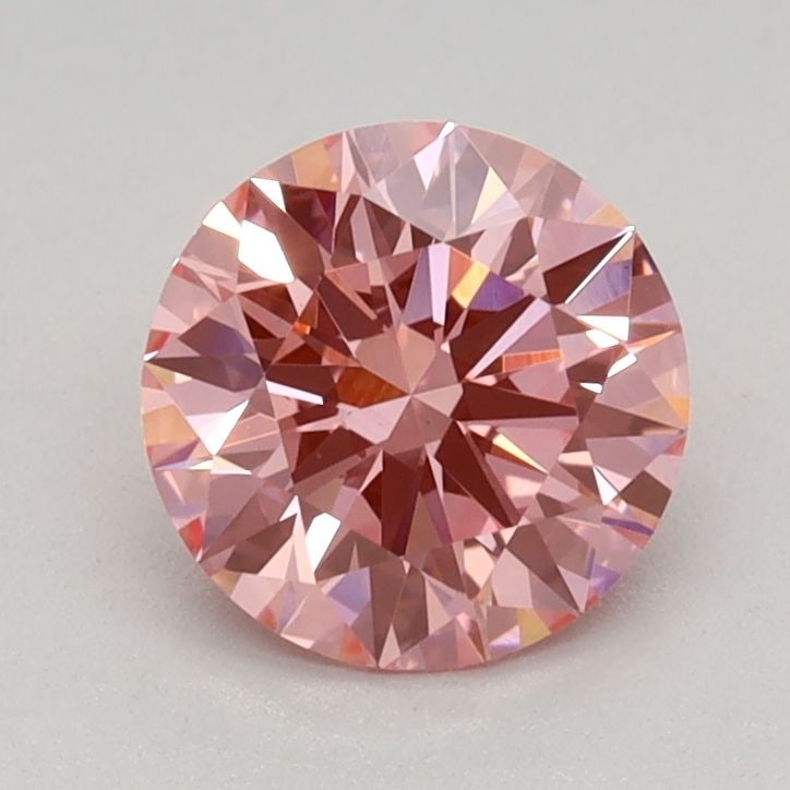 Ideal Loose Diamond - ROUND 0.77ct Fancy Vivid Pink VS1: Ideal Loose Diamond - ROUND 0.77ct Fancy Vivid Pink VS1 Source: This is a real non-mined Diamond that has been grown in a lab Shape: ROUND Carats: 0.77 Color: Fancy Vivid Pink Certification: IGI Video