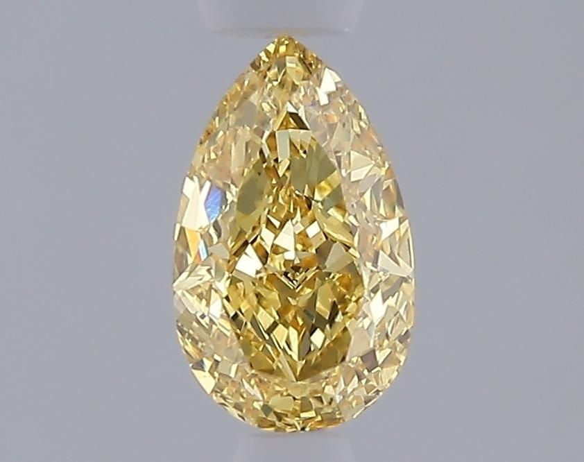 Loose Diamond - PEAR 1.03ct Fancy Vivid Yellow VVS2: Loose Diamond - PEAR 1.03ct Fancy Vivid Yellow VVS2 Source: This is a real non-mined Diamond that has been grown in a lab Shape: PEAR Carats: 1.03 Color: Fancy Vivid Yellow Certification: IGI Video: