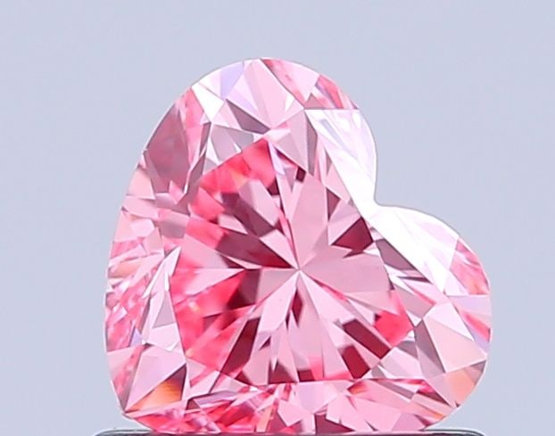 Loose Diamond - HEART 0.8ct Fancy Vivid Pink VS1: Loose Diamond - HEART 0.8ct Fancy Vivid Pink VS1 Source: This is a real non-mined Diamond that has been grown in a lab Shape: HEART Carats: 0.8 Color: Fancy Vivid Pink Certification: IGI Video: