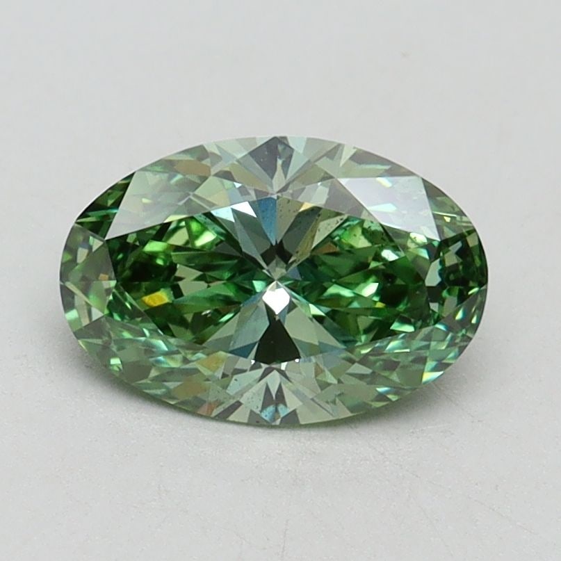 Loose Diamond - OVAL 1.01ct Fancy Vivid Green VS2: Loose Diamond - OVAL 1.01ct Fancy Vivid Green VS2 Source: This is a real non-mined Diamond that has been grown in a lab Shape: OVAL Carats: 1.01 Color: Fancy Vivid Green Certification: IGI Video: