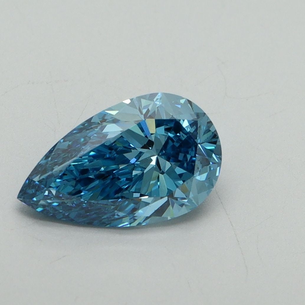 Loose Diamond - PEAR 1.31ct Fancy Vivid Blue VS2: Loose Diamond - PEAR 1.31ct Fancy Vivid Blue VS2 Source: This is a real non-mined Diamond that has been grown in a lab Shape: PEAR Carats: 1.31 Color: Fancy Vivid Blue Certification: IGI Video: