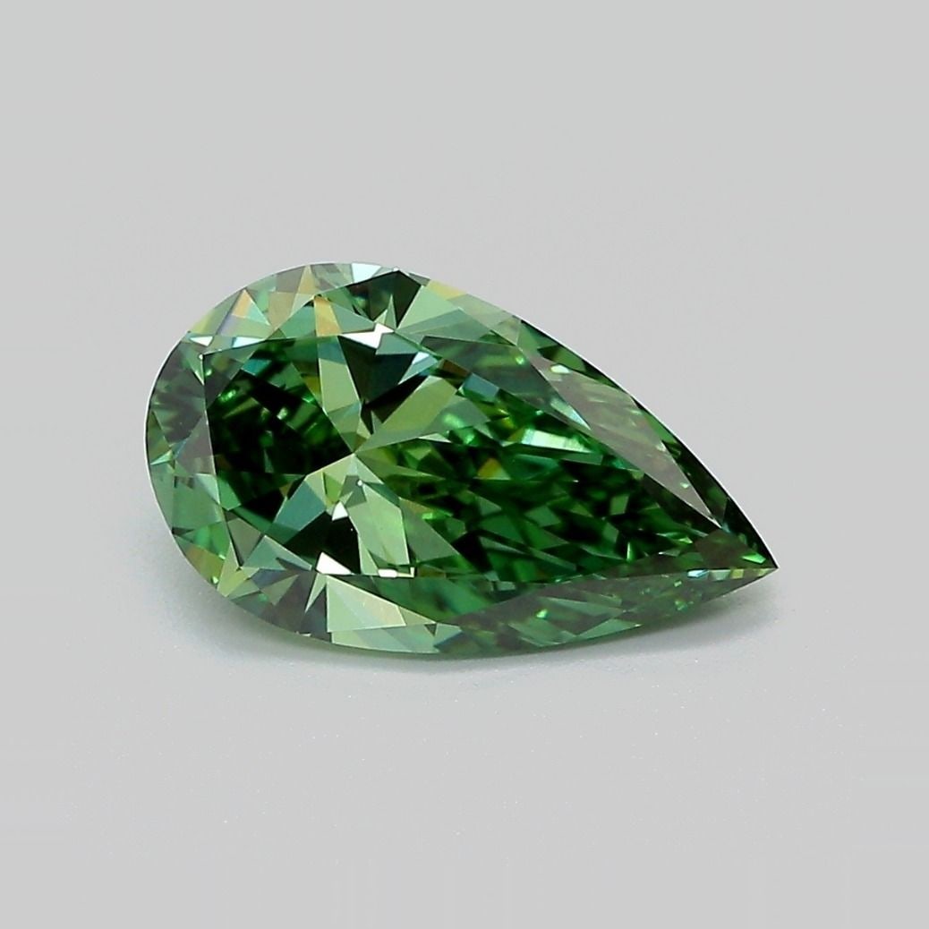 Loose Diamond - PEAR 2.01ct Fancy Vivid Green VVS2: Loose Diamond - PEAR 2.01ct Fancy Vivid Green VVS2 Source: This is a real non-mined Diamond that has been grown in a lab Shape: PEAR Carats: 2.01 Color: Fancy Vivid Green Certification: IGI Video: