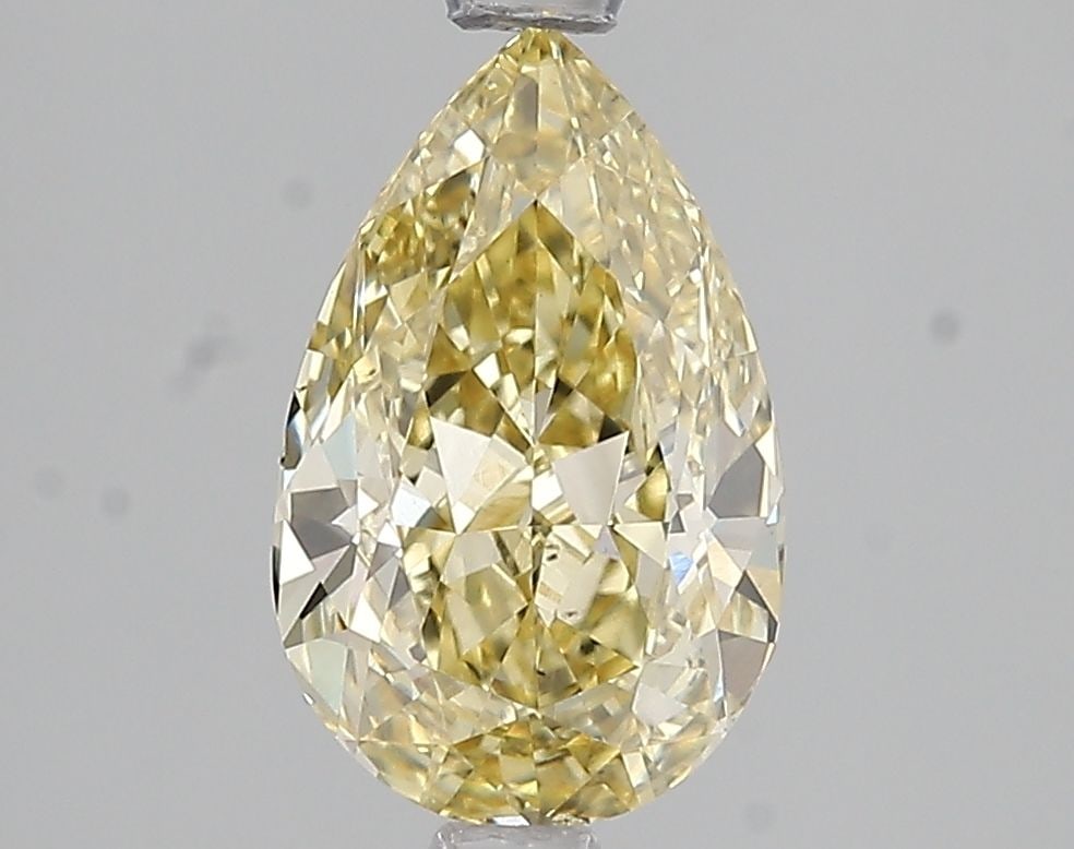 Loose Diamond - PEAR 2.04ct Fancy Intense Yellow VS2: Loose Diamond - PEAR 2.04ct Fancy Intense Yellow VS2 Source: This is a real non-mined Diamond that has been grown in a lab Shape: PEAR Carats: 2.04 Color: Fancy Intense Yellow Certification: IGI Video