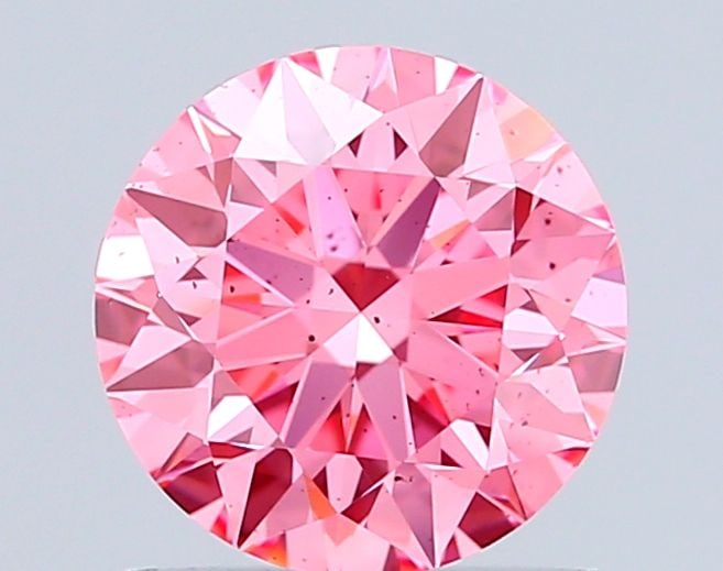 Ideal Loose Diamond - ROUND 1.02ct Fancy Vivid Pink SI1: Ideal Loose Diamond - ROUND 1.02ct Fancy Vivid Pink SI1 Source: This is a real non-mined Diamond that has been grown in a lab Shape: ROUND Carats: 1.02 Color: Fancy Vivid Pink Certification: IGI Video