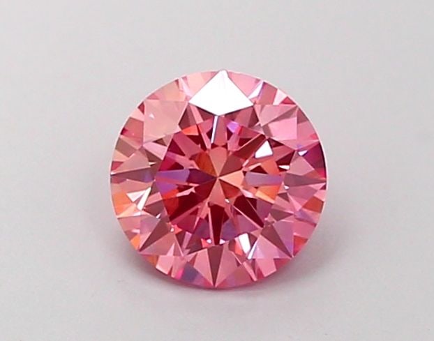 Ideal Loose Diamond - ROUND 1.01ct Fancy Vivid Pink VVS2: Ideal Loose Diamond - ROUND 1.01ct Fancy Vivid Pink VVS2 Source: This is a real non-mined Diamond that has been grown in a lab Shape: ROUND Carats: 1.01 Color: Fancy Vivid Pink Certification: IGI Vide