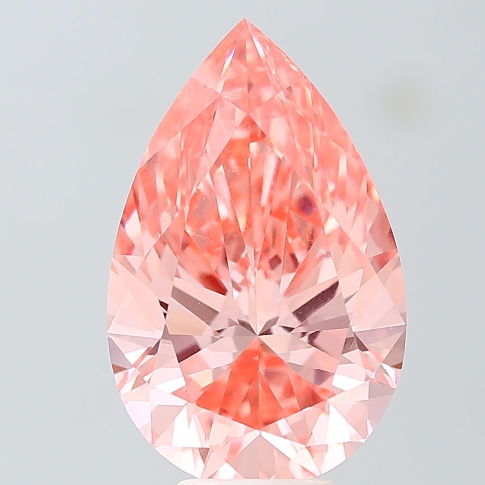 Loose Diamond - PEAR 7.04ct Fancy Vivid Orangey Pink VS1: Loose Diamond - PEAR 7.04ct Fancy Vivid Orangey Pink VS1 Source: This is a real non-mined Diamond that has been grown in a lab Shape: PEAR Carats: 7.04 Color: Fancy Vivid Orangey Pink Certification: I