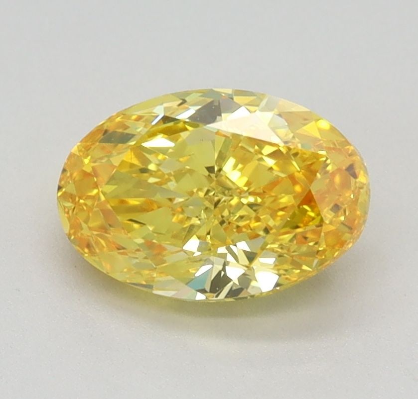 Loose Diamond - OVAL 1.02ct Fancy Vivid Yellow VS1: Loose Diamond - OVAL 1.02ct Fancy Vivid Yellow VS1 Source: This is a real non-mined Diamond that has been grown in a lab Shape: OVAL Carats: 1.02 Color: Fancy Vivid Yellow Certification: IGI Video: