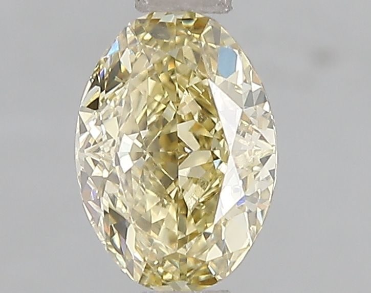 Loose Diamond - OVAL 1.09ct Fancy Yellow VVS2: Loose Diamond - OVAL 1.09ct Fancy Yellow VVS2 Source: This is a real non-mined Diamond that has been grown in a lab Shape: OVAL Carats: 1.09 Color: Fancy Yellow Certification: IGI Video: