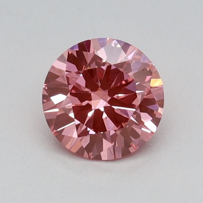 Loose Diamond - ROUND 0.44ct Fancy Vivid Pink VS1: Loose Diamond - ROUND 0.44ct Fancy Vivid Pink VS1 Source: This is a real non-mined Diamond that has been grown in a lab Shape: ROUND Carats: 0.44 Color: Fancy Vivid Pink Certification: IGI Video: