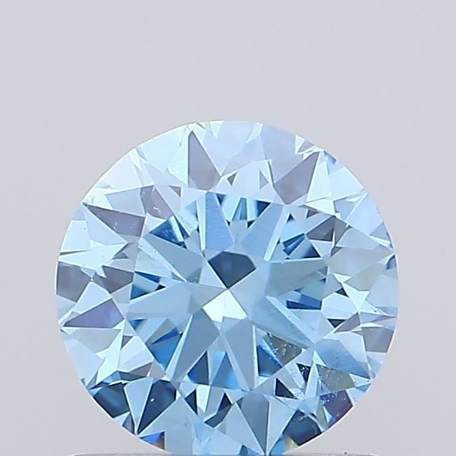 Loose Diamond - ROUND 0.81ct Fancy Vivid Blue SI1: Loose Diamond - ROUND 0.81ct Fancy Vivid Blue SI1 Source: This is a real non-mined Diamond that has been grown in a lab Shape: ROUND Carats: 0.81 Color: Fancy Vivid Blue Certification: IGI Video:
