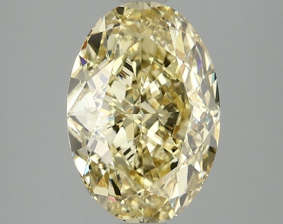 Loose Diamond - OVAL 3.1ct Fancy Intense Yellow VS1: Loose Diamond - OVAL 3.1ct Fancy Intense Yellow VS1 Source: This is a real non-mined Diamond that has been grown in a lab Shape: OVAL Carats: 3.1 Color: Fancy Intense Yellow Certification: IGI Video: