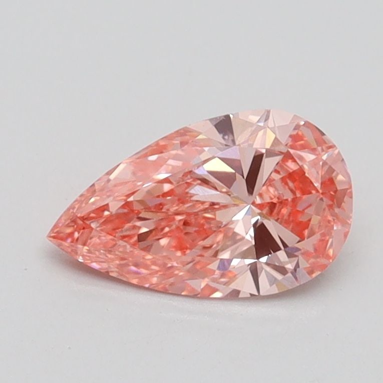Loose Diamond - PEAR 0.7ct Fancy Vivid Pink VVS2: Loose Diamond - PEAR 0.7ct Fancy Vivid Pink VVS2 Source: This is a real non-mined Diamond that has been grown in a lab Shape: PEAR Carats: 0.7 Color: Fancy Vivid Pink Certification: IGI Video: