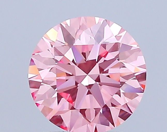 Ideal Loose Diamond - ROUND 1.5ct Fancy Vivid Pink VVS2: Ideal Loose Diamond - ROUND 1.5ct Fancy Vivid Pink VVS2 Source: This is a real non-mined Diamond that has been grown in a lab Shape: ROUND Carats: 1.5 Color: Fancy Vivid Pink Certification: IGI Video: