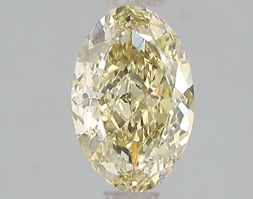Loose Diamond - OVAL 1.54ct Fancy Intense Yellow VS2: Loose Diamond - OVAL 1.54ct Fancy Intense Yellow VS2 Source: This is a real non-mined Diamond that has been grown in a lab Shape: OVAL Carats: 1.54 Color: Fancy Intense Yellow Certification: IGI Video
