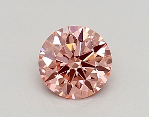 Ideal Loose Diamond - ROUND 0.31ct Fancy Vivid Pink VVS2: Ideal Loose Diamond - ROUND 0.31ct Fancy Vivid Pink VVS2 Source: This is a real non-mined Diamond that has been grown in a lab Shape: ROUND Carats: 0.31 Color: Fancy Vivid Pink Certification: IGI Vide