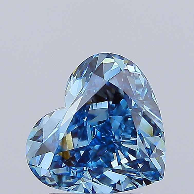 Loose Diamond - HEART 3.06ct Fancy Vivid Blue VS1: Loose Diamond - HEART 3.06ct Fancy Vivid Blue VS1 Source: This is a real non-mined Diamond that has been grown in a lab Shape: HEART Carats: 3.06 Color: Fancy Vivid Blue Certification: IGI Video: