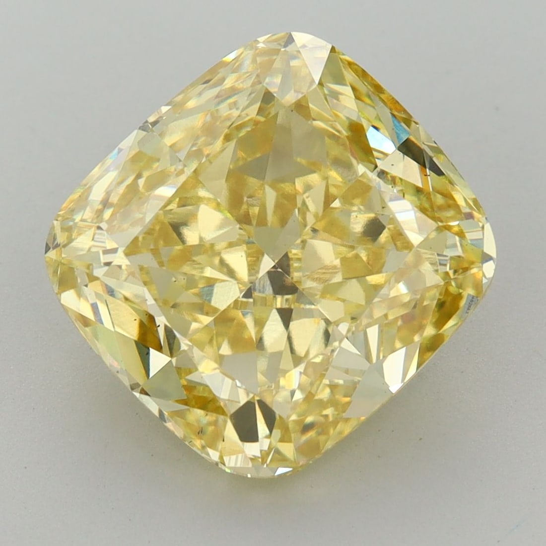 Loose Diamond - CUSHION BRILLIANT 6.19ct Fancy Vivid Yellow VS2: Loose Diamond - CUSHION BRILLIANT 6.19ct Fancy Vivid Yellow VS2 Source: This is a real non-mined Diamond that has been grown in a lab Shape: CUSHION BRILLIANT Carats: 6.19 Color: Fancy Vivid Yellow