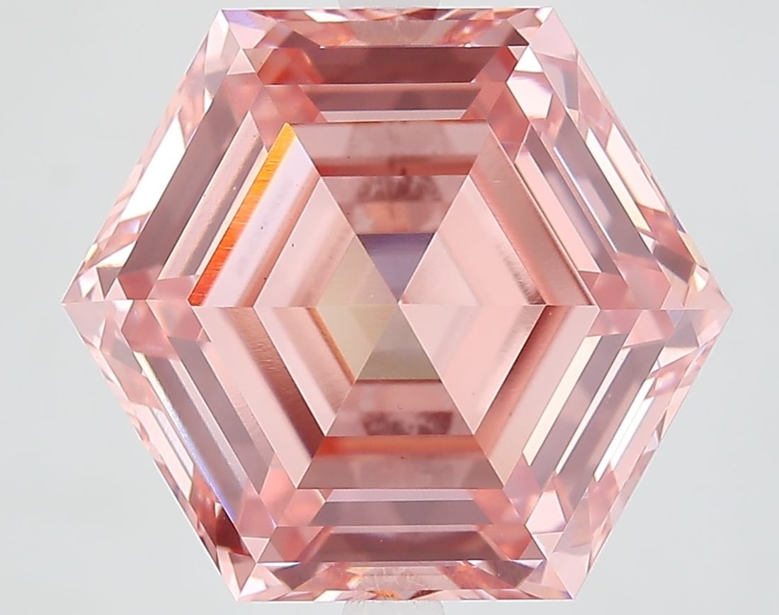 Loose Diamond - HEXAGONAL 9.27ct Fancy Vivid Pink VS1: Loose Diamond - HEXAGONAL 9.27ct Fancy Vivid Pink VS1 Source: This is a real non-mined Diamond that has been grown in a lab Shape: HEXAGONAL Carats: 9.27 Color: Fancy Vivid Pink Certification: IGI Vid