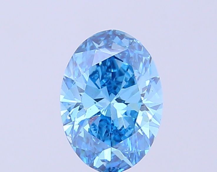 Loose Diamond - OVAL 1.36ct Fancy Vivid Blue VS2: Loose Diamond - OVAL 1.36ct Fancy Vivid Blue VS2 Source: This is a real non-mined Diamond that has been grown in a lab Shape: OVAL Carats: 1.36 Color: Fancy Vivid Blue Certification: IGI Video: