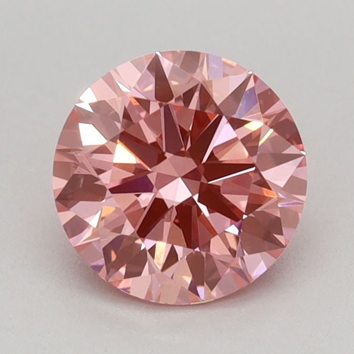 Ideal Loose Diamond - ROUND 0.81ct Fancy Vivid Pink VS1: Ideal Loose Diamond - ROUND 0.81ct Fancy Vivid Pink VS1 Source: This is a real non-mined Diamond that has been grown in a lab Shape: ROUND Carats: 0.81 Color: Fancy Vivid Pink Certification: IGI Video