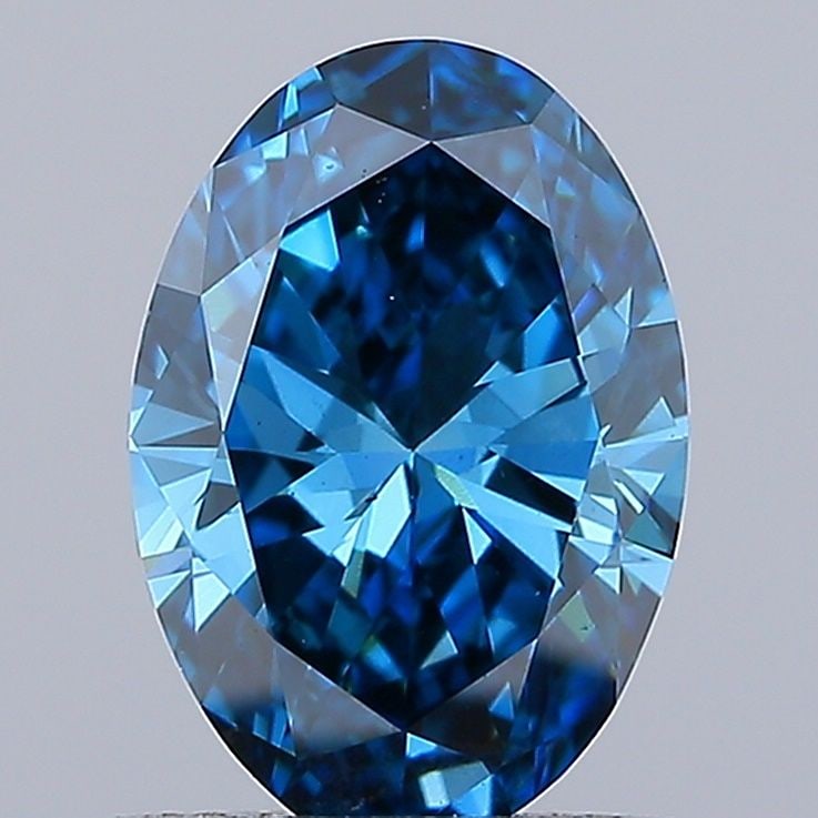 Loose Diamond - OVAL 1.0ct Fancy Vivid Blue VS1: Loose Diamond - OVAL 1.0ct Fancy Vivid Blue VS1 Source: This is a real non-mined Diamond that has been grown in a lab Shape: OVAL Carats: 1.0 Color: Fancy Vivid Blue Certification: IGI Video: