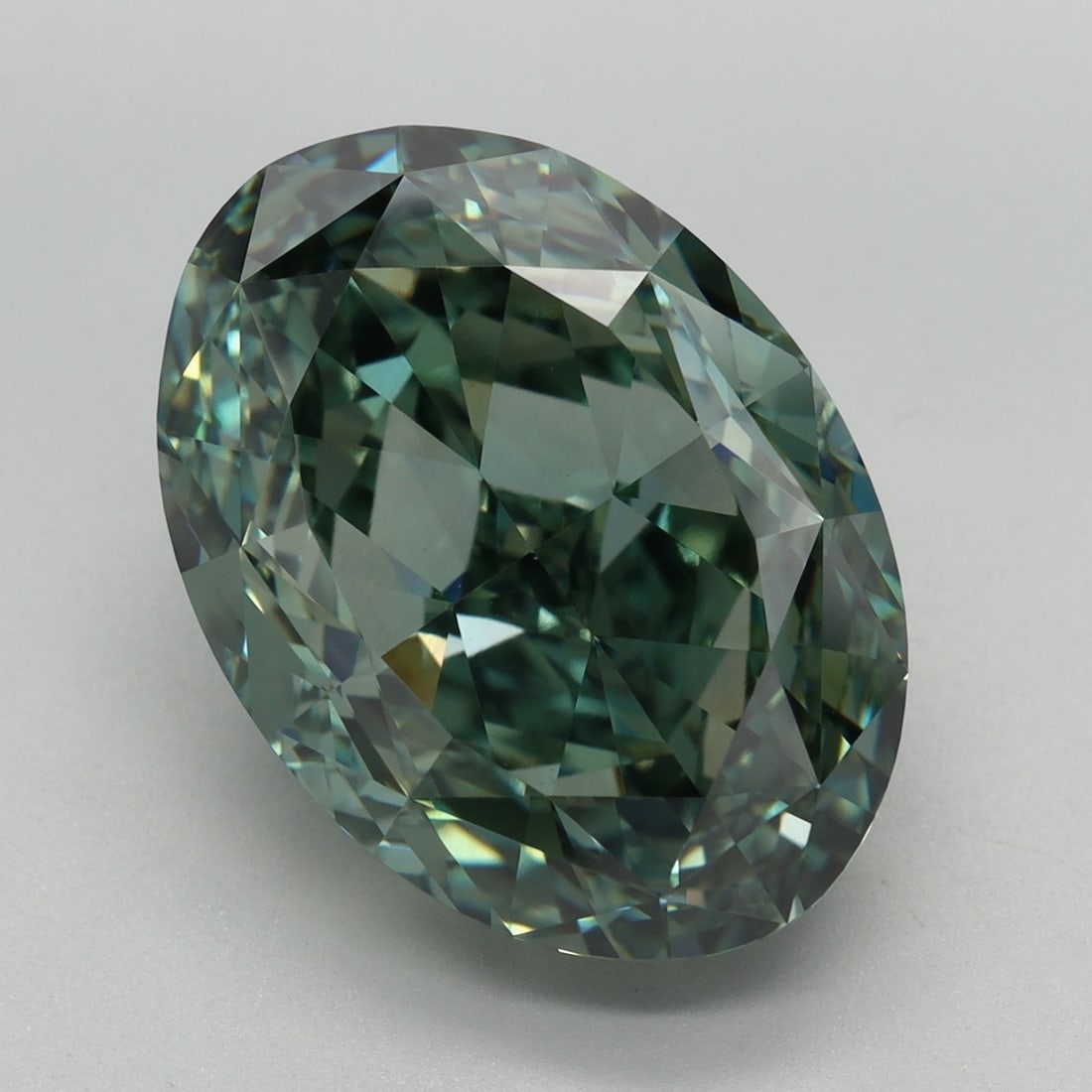 Loose Diamond - OVAL 9.96ct Fancy Vivid Green VVS2: Loose Diamond - OVAL 9.96ct Fancy Vivid Green VVS2 Source: This is a real non-mined Diamond that has been grown in a lab Shape: OVAL Carats: 9.96 Color: Fancy Vivid Green Certification: IGI Video: