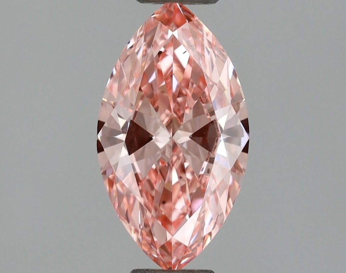 Loose Diamond - MARQUISE 0.74ct Fancy Vivid Pink VS2: Loose Diamond - MARQUISE 0.74ct Fancy Vivid Pink VS2 Source: This is a real non-mined Diamond that has been grown in a lab Shape: MARQUISE Carats: 0.74 Color: Fancy Vivid Pink Certification: IGI Video