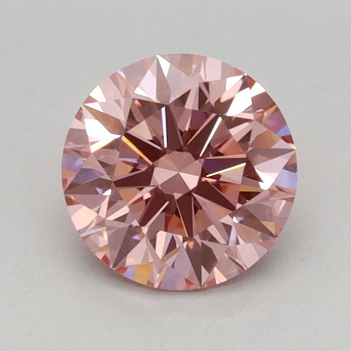 Ideal Loose Diamond - ROUND 0.66ct Fancy Vivid Pink VVS2: Ideal Loose Diamond - ROUND 0.66ct Fancy Vivid Pink VVS2 Source: This is a real non-mined Diamond that has been grown in a lab Shape: ROUND Carats: 0.66 Color: Fancy Vivid Pink Certification: IGI Vide