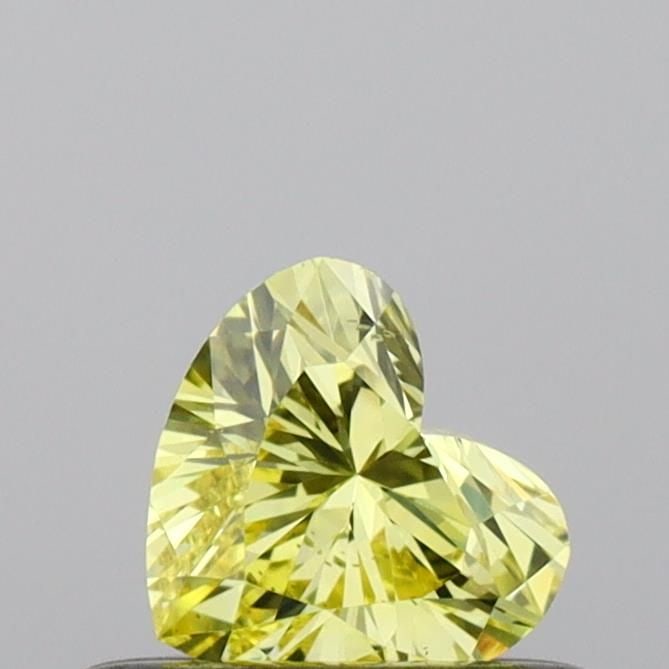Loose Diamond - HEART 0.33ct Fancy Vivid Yellow SI1: Loose Diamond - HEART 0.33ct Fancy Vivid Yellow SI1 Source: This is a real non-mined Diamond that has been grown in a lab Shape: HEART Carats: 0.33 Color: Fancy Vivid Yellow Certification: IGI Video: