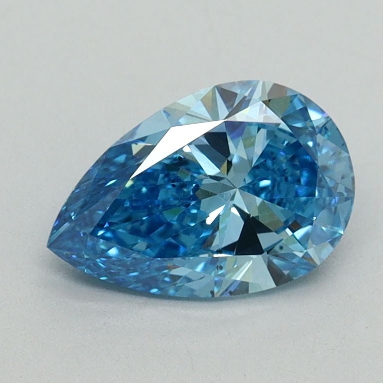 Loose Diamond - PEAR 1.0ct Fancy Vivid Blue VS2: Loose Diamond - PEAR 1.0ct Fancy Vivid Blue VS2 Source: This is a real non-mined Diamond that has been grown in a lab Shape: PEAR Carats: 1.0 Color: Fancy Vivid Blue Certification: IGI Video: