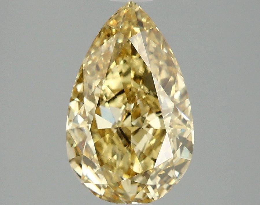 Loose Diamond - PEAR 2.08ct Fancy Vivid Yellow VS1: Loose Diamond - PEAR 2.08ct Fancy Vivid Yellow VS1 Source: This is a real non-mined Diamond that has been grown in a lab Shape: PEAR Carats: 2.08 Color: Fancy Vivid Yellow Certification: IGI Video: