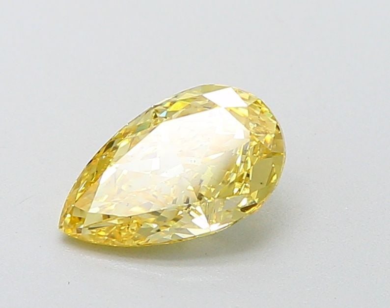 Loose Diamond - PEAR 1.0ct Fancy Yellow VS2: Loose Diamond - PEAR 1.0ct Fancy Yellow VS2 Source: This is a real non-mined Diamond that has been grown in a lab Shape: PEAR Carats: 1.0 Color: Fancy Yellow Certification: IGI Video: