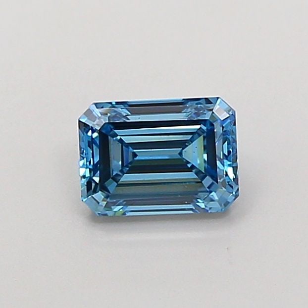 Loose Diamond - EMERALD 0.91ct Fancy Vivid Blue VS2: Loose Diamond - EMERALD 0.91ct Fancy Vivid Blue VS2 Source: This is a real non-mined Diamond that has been grown in a lab Shape: EMERALD Carats: 0.91 Color: Fancy Vivid Blue Certification: IGI Video: