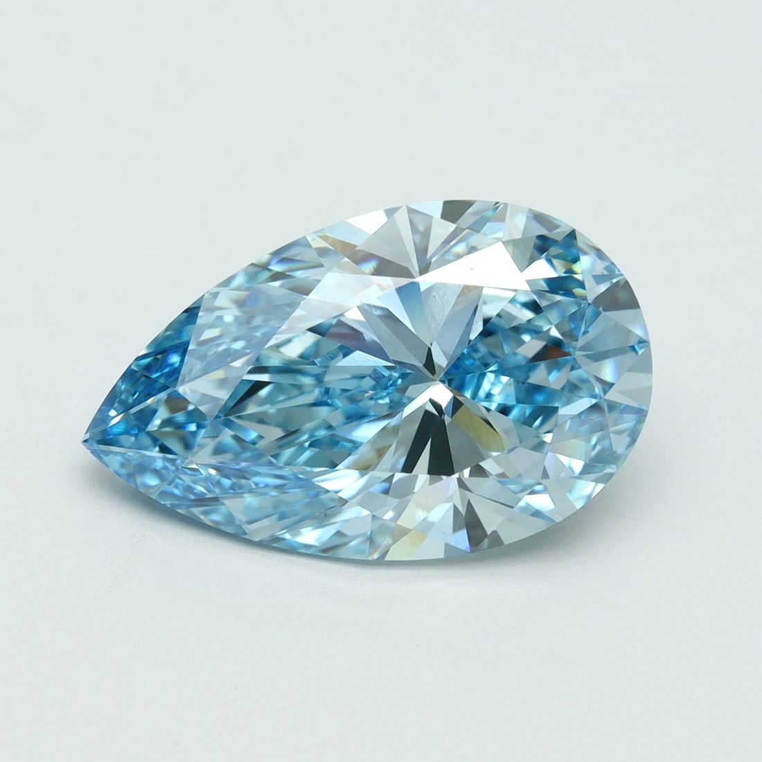 Loose Diamond - PEAR 7.06ct Fancy Vivid Blue VS1: Loose Diamond - PEAR 7.06ct Fancy Vivid Blue VS1 Source: This is a real non-mined Diamond that has been grown in a lab Shape: PEAR Carats: 7.06 Color: Fancy Vivid Blue Certification: IGI Video: