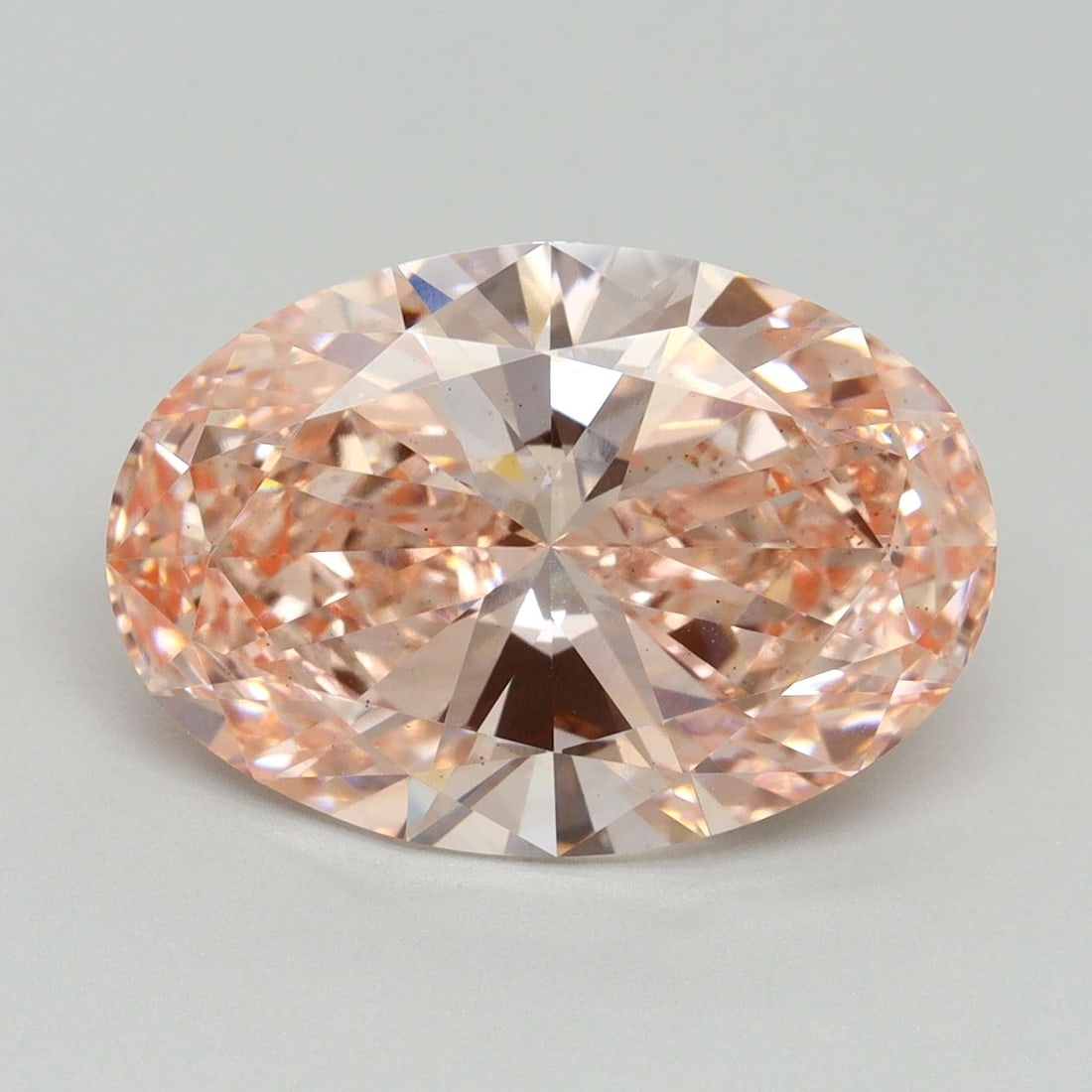 Loose Diamond - OVAL 6.05ct Fancy Vivid Pink VS2: Loose Diamond - OVAL 6.05ct Fancy Vivid Pink VS2 Source: This is a real non-mined Diamond that has been grown in a lab Shape: OVAL Carats: 6.05 Color: Fancy Vivid Pink Certification: IGI Video:
