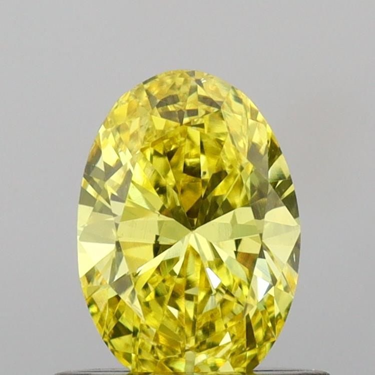 Loose Diamond - OVAL 0.64ct Fancy Vivid Yellow VS2: Loose Diamond - OVAL 0.64ct Fancy Vivid Yellow VS2 Source: This is a real non-mined Diamond that has been grown in a lab Shape: OVAL Carats: 0.64 Color: Fancy Vivid Yellow Certification: IGI Video: