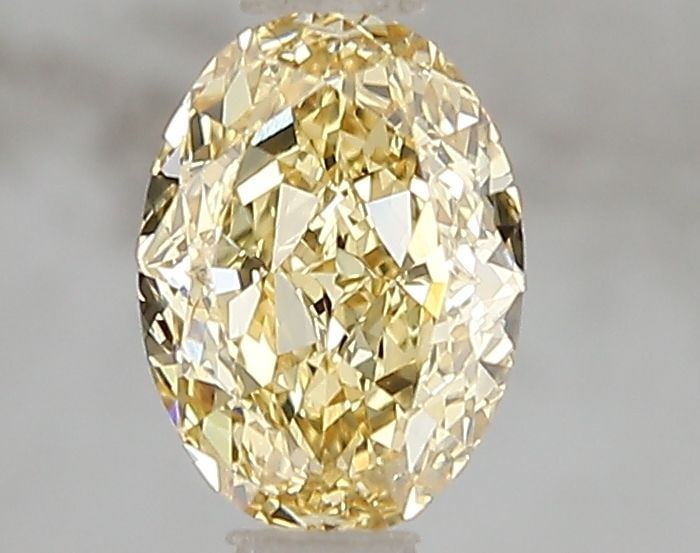 Loose Diamond - OVAL 1.01ct Fancy Intense Yellow VS1: Loose Diamond - OVAL 1.01ct Fancy Intense Yellow VS1 Source: This is a real non-mined Diamond that has been grown in a lab Shape: OVAL Carats: 1.01 Color: Fancy Intense Yellow Certification: IGI Video