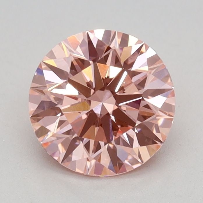 Ideal Loose Diamond - ROUND 0.79ct Fancy Vivid Pink VS1: Ideal Loose Diamond - ROUND 0.79ct Fancy Vivid Pink VS1 Source: This is a real non-mined Diamond that has been grown in a lab Shape: ROUND Carats: 0.79 Color: Fancy Vivid Pink Certification: IGI Video