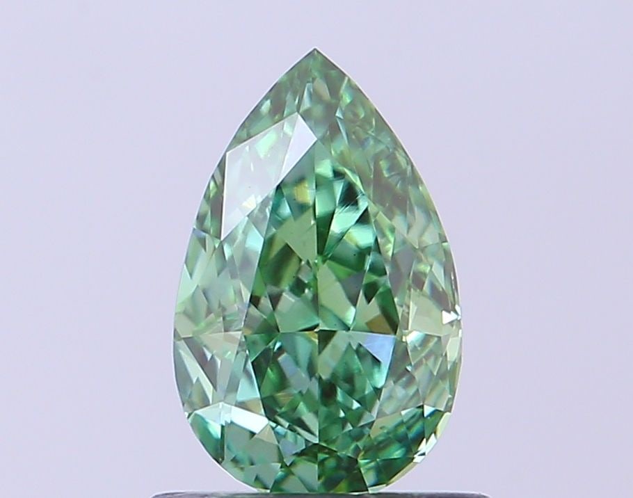 Loose Diamond - PEAR 0.71ct Fancy Vivid Green VS1: Loose Diamond - PEAR 0.71ct Fancy Vivid Green VS1 Source: This is a real non-mined Diamond that has been grown in a lab Shape: PEAR Carats: 0.71 Color: Fancy Vivid Green Certification: IGI Video: