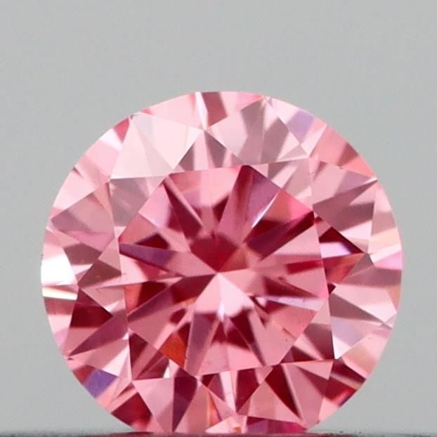 Loose Diamond - ROUND 0.22ct Fancy Vivid Pink VS1: Loose Diamond - ROUND 0.22ct Fancy Vivid Pink VS1 Source: This is a real non-mined Diamond that has been grown in a lab Shape: ROUND Carats: 0.22 Color: Fancy Vivid Pink Certification: IGI Video: