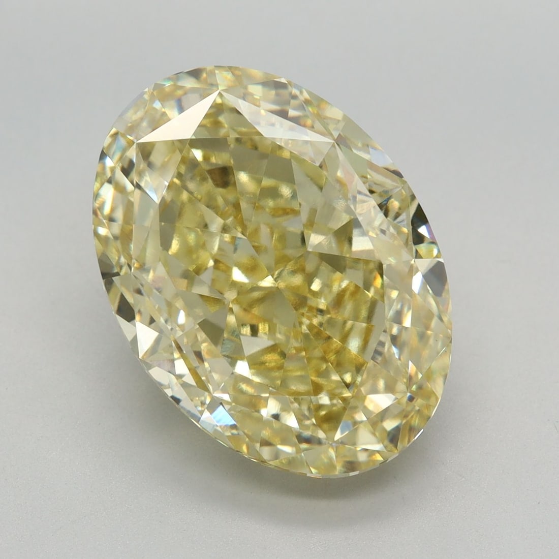 Loose Diamond - OVAL 8.11ct Fancy Yellow VVS2: Loose Diamond - OVAL 8.11ct Fancy Yellow VVS2 Source: This is a real non-mined Diamond that has been grown in a lab Shape: OVAL Carats: 8.11 Color: Fancy Yellow Certification: IGI Video: