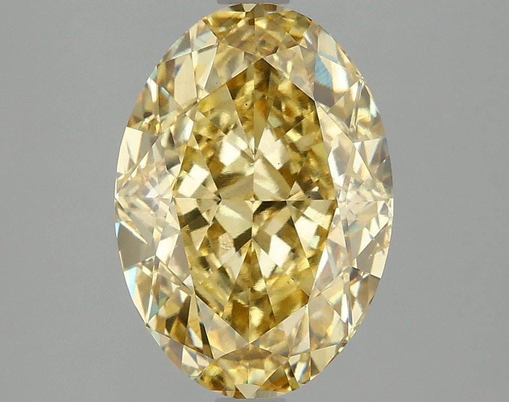 Loose Diamond - OVAL 4.09ct Fancy Vivid Yellow SI1: Loose Diamond - OVAL 4.09ct Fancy Vivid Yellow SI1 Source: This is a real non-mined Diamond that has been grown in a lab Shape: OVAL Carats: 4.09 Color: Fancy Vivid Yellow Certification: IGI Video: