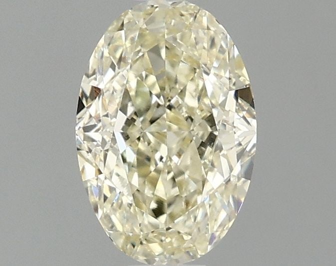 Loose Diamond - OVAL 1.1ct Fancy Yellow VVS2: Loose Diamond - OVAL 1.1ct Fancy Yellow VVS2 Source: This is a real non-mined Diamond that has been grown in a lab Shape: OVAL Carats: 1.1 Color: Fancy Yellow Certification: IGI Video: