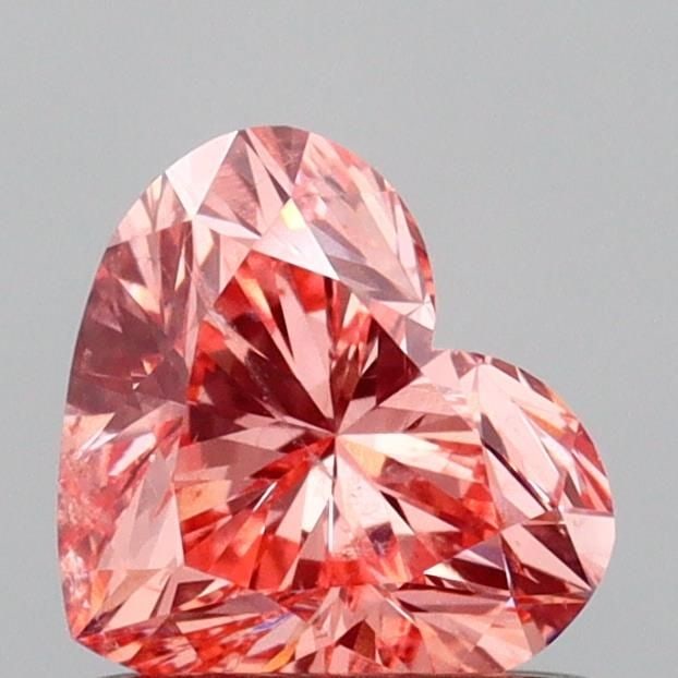 Loose Diamond - HEART 0.76ct Fancy Vivid Pink SI2: Loose Diamond - HEART 0.76ct Fancy Vivid Pink SI2 Source: This is a real non-mined Diamond that has been grown in a lab Shape: HEART Carats: 0.76 Color: Fancy Vivid Pink Certification: IGI Video: