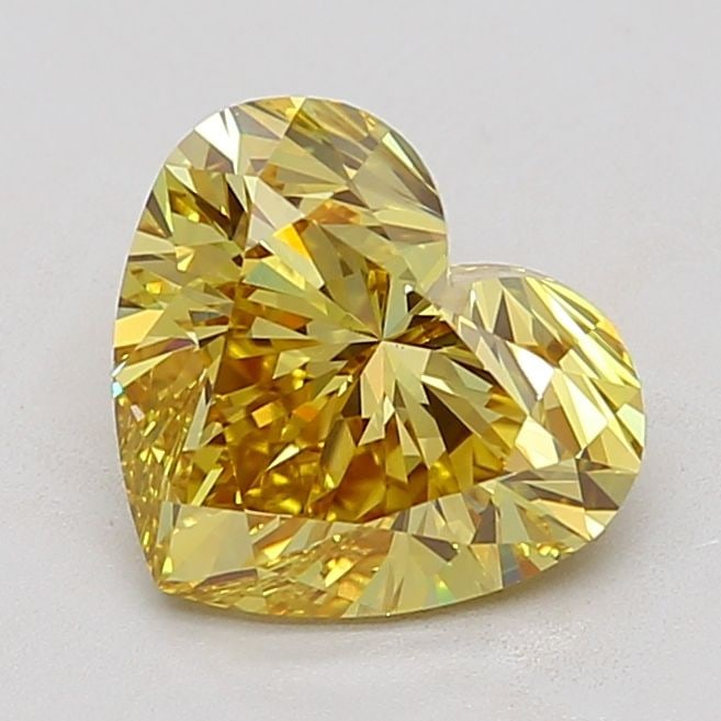 Loose Diamond - HEART 5.01ct Fancy Vivid Yellow VS1: Loose Diamond - HEART 5.01ct Fancy Vivid Yellow VS1 Source: This is a real non-mined Diamond that has been grown in a lab Shape: HEART Carats: 5.01 Color: Fancy Vivid Yellow Certification: IGI Video: