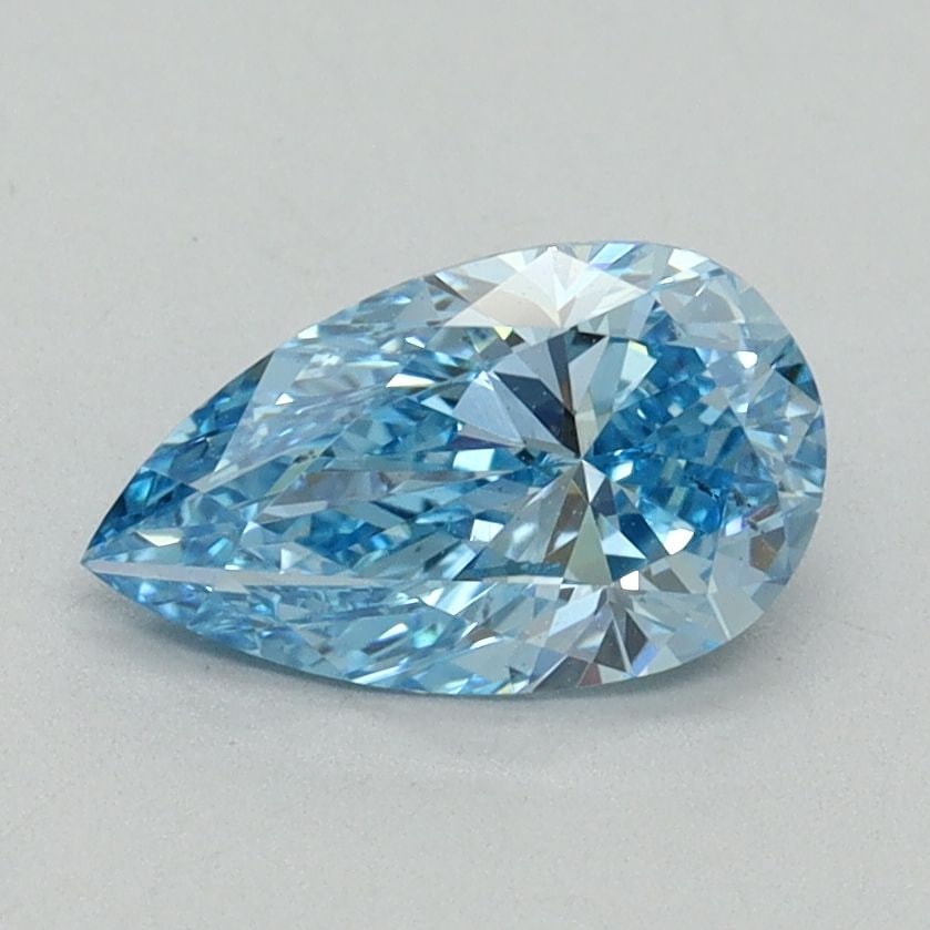Loose Diamond - PEAR 1.0ct Fancy Vivid Blue VS2: Loose Diamond - PEAR 1.0ct Fancy Vivid Blue VS2 Source: This is a real non-mined Diamond that has been grown in a lab Shape: PEAR Carats: 1.0 Color: Fancy Vivid Blue Certification: IGI Video: